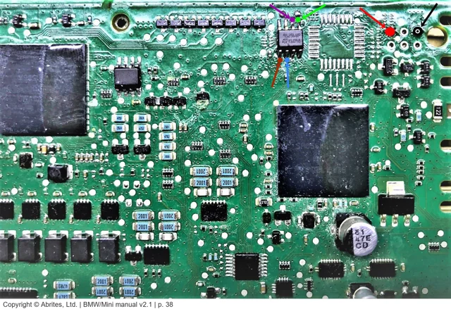 Earlier BMW BDC circuit board with the EEPROM connection points marked by Abrites