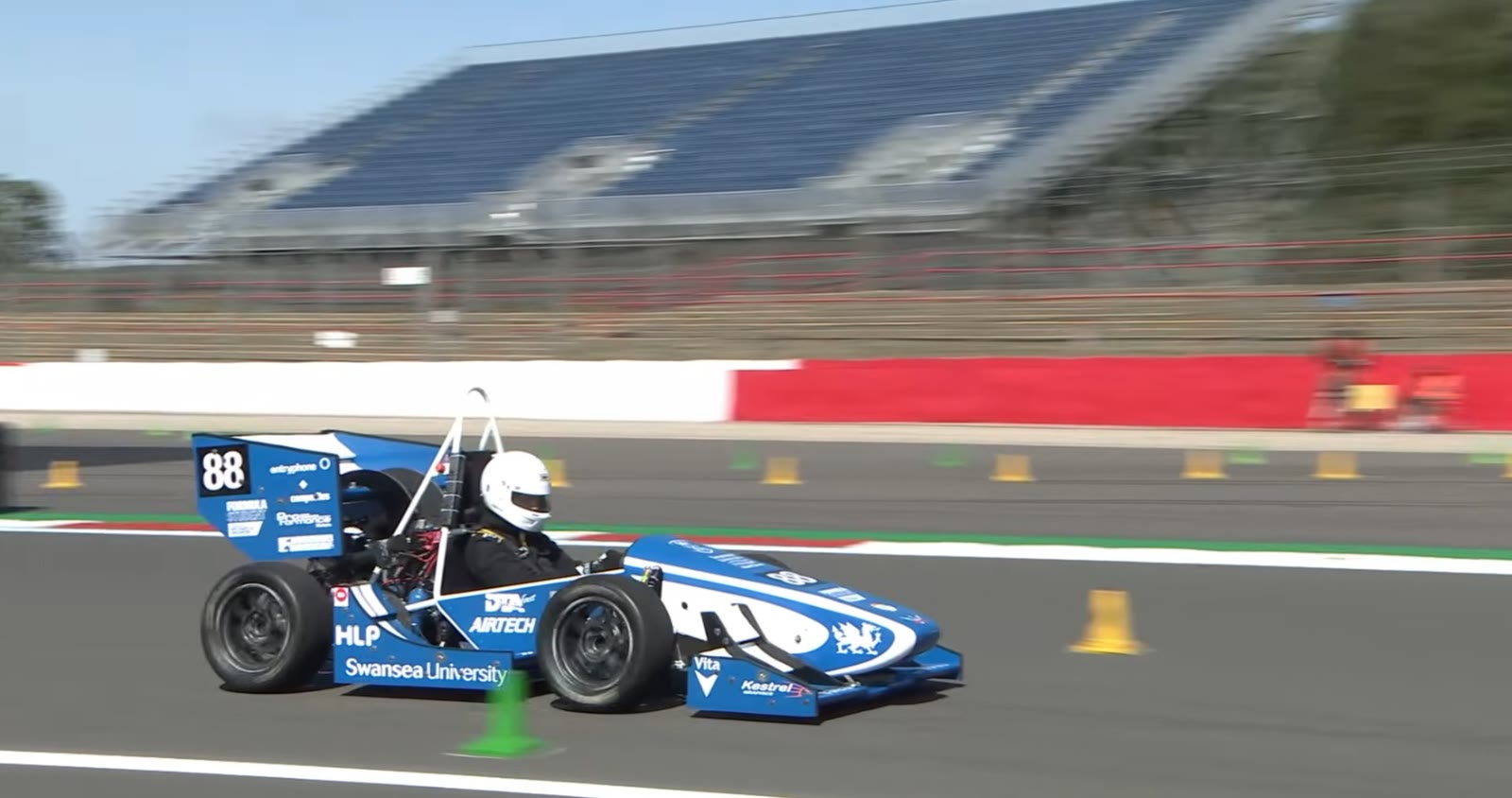 Blue and white Swansea University Race Engineering Formula Student car number 88 driving on circuit